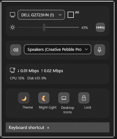 TrayPilot flyout with monitor brightness, audio device controls, live network activity, and quick Windows settings